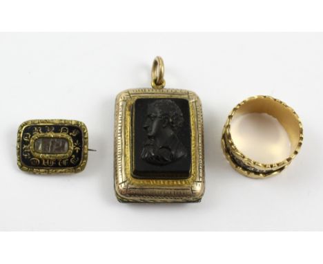 An 18ct gold and black enamel mourning ring, size M1/2, approx 5.8g, a yellow metal and black enamel Victorian mourning brooc