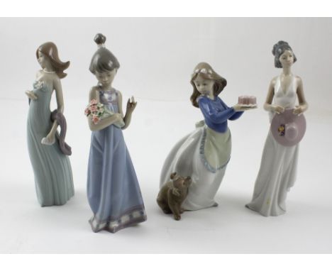 Two Lladró figures of elegant ladies, one with wide-brimmed hat, height 21cm, the other with pashmina, a further Lladró figur