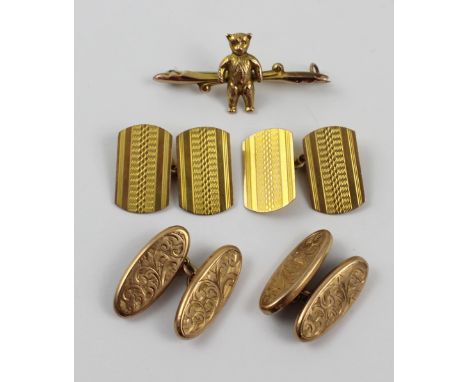 Two pairs of 9ct gold cufflinks and a yellow metal bar brooch with teddy bear to the centre, approx combined 9g (3).