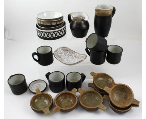 A collection of studio ceramics to include Shanagarry coffee ware, seven studio pottery dishes in the form of quaichs, marked