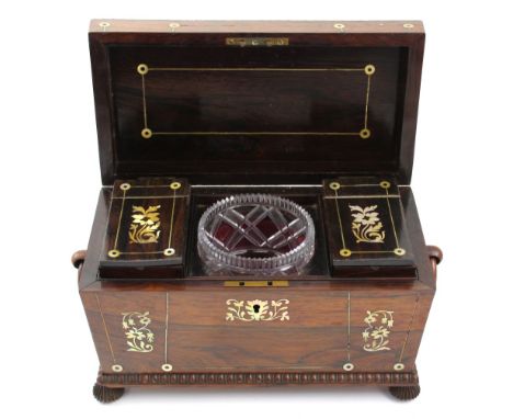 A Victorian mother of pearl inlaid rosewood sarcophagus tea caddy with original twin tea canisters and sugar bowl, supported 