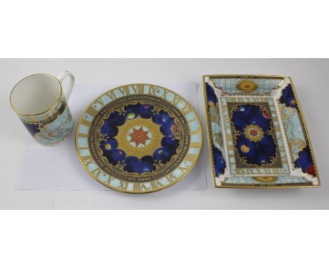 A collection of Royal Worcester 'The Millennium' pattern ceramics to include a mug with Roman clock chapter ring to the rim a