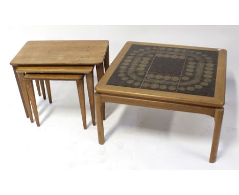 A c1970 tile-top walnut coffee table and a nest of similar period designer walnut tables on tapering legs, height 46cm (2).