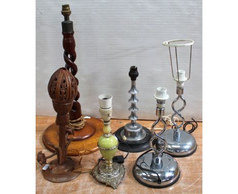 Six table lamps to include a pair of white metal elliptical column table lamps, a yellow metal and onyx style table lamp, a c