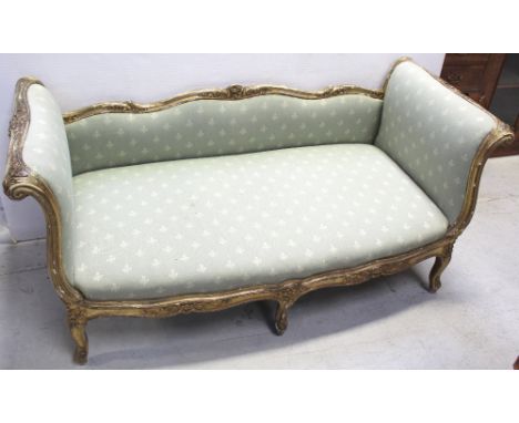 A late 19th century French-style gilt wood and gesso scroll arm sofa, made by Charles Mellier &amp; Co Master Cabinet Makers 