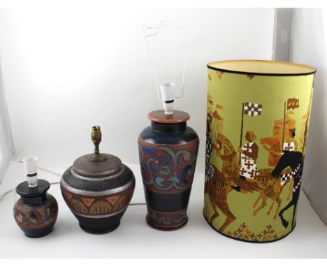 Three similar terracotta lamp bases of baluster form, height of largest 44cm and a 1930s Arts and Crafts Medieval revival cyl