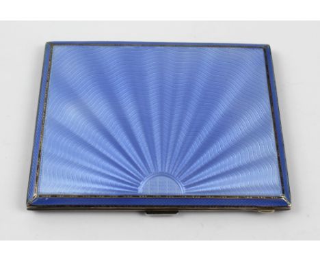 A silver engine-turned and enamelled cigarette case with light blue enamels and sunburst decoration, case marked 'With love B