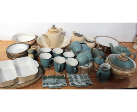 A large collection of Denby oven-to-table and dinner ware to include vegetable tureens, mixing bowl, five cereal bowls, milk 