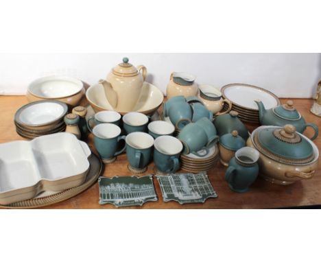 A large collection of Denby oven-to-table and dinner ware to include vegetable tureens, mixing bowl, five cereal bowls, milk 