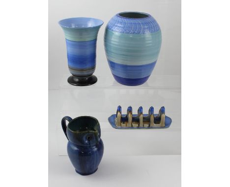 A Shelley drip glaze ceramic toast rack, a banded Shelley obovoid vase, height 21cm, a similar Shelley trumpet vase on footed