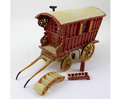 A scratch-built and hand-painted scale model of a Romany Chertsey wagon, with miniature steps, height 18.5cm.