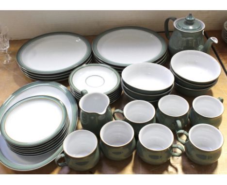 A Denby part dinner and tea service comprising eight dinner plates, six cereal bowls, six cups and saucers, six side plates, 