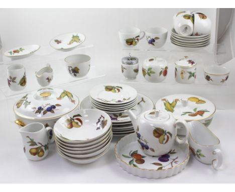 A quantity of Royal Worcester 'Evesham' tea and dinner ware to include plates, bowls, cups, saucers, tureens, flan dish, milk