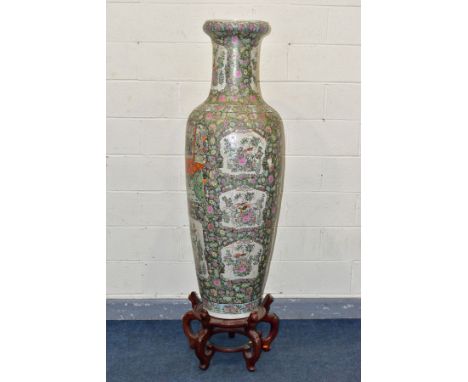 A LARGE CANTON FAMILLE ROSE ENAMELLED HANDPAINTED BALUSTER VASE, on hardwood carved stand,the vase decorated with chrysanthem