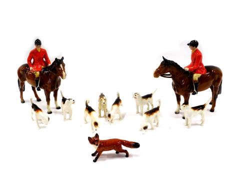 A Beswick ceramic part hunting set, to include two huntsman seated on brown horses, various hounds and a small fox. (AF)