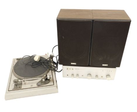 A dual 505 belt drive turntable, a Rotel amplifier, and a pair of Wharfedale Laser Range speakers. (AF)&nbsp;