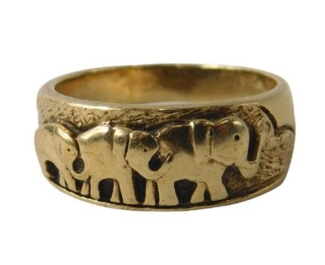 An Eastern inspired dress ring, with graduated design of three elephants, yellow metal, unmarked, believed to be 9ct gold, ri