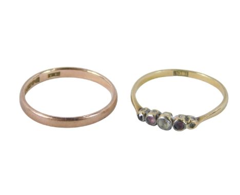 A 9ct rose gold wedding band, of plain design, and an 18ct gold diamond and ruby set dress ring, 2.7g all in. (2)
