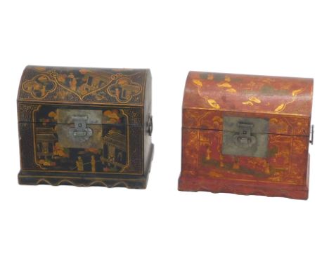 An Oriental red and gilt decorated dome topped trunk, with side handles, and a similar black example, 36cm wide. (AF)