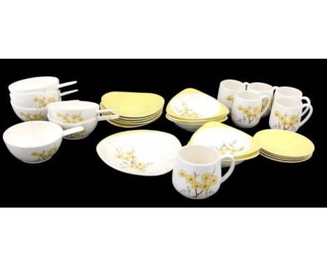 A Carltonware buttercup tea service, comprising five bowls, six soup cups, five mugs, five saucers, etc. 