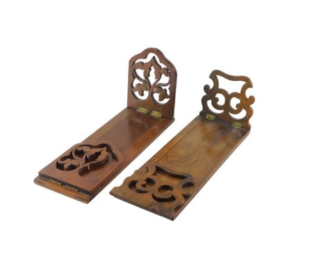 Two 19thC book slides, comprising one with carved harp ends in walnut and another oak example. (2)