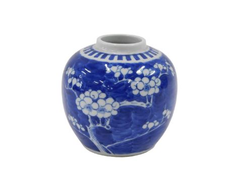 An early 20thC Chinese blue and white ginger jar, with cherry blossom and two ring stamp to underside, 9.5cm high. 