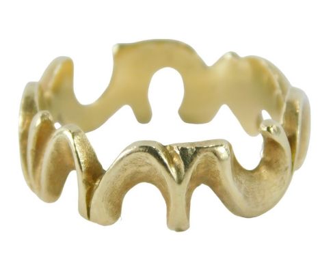 An 18ct gold modern dress ring, of polished horseshoe design, ring size O, 4.5g, boxed.