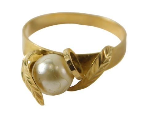 A modern dress ring, set with cultured pearl, with twist and vine decoration, plated. 