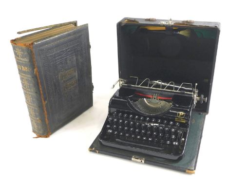 A Victorian Reverend John Brown self interpreting Bible, published by Edward Slater, in leather binding, and a typewriter. (2