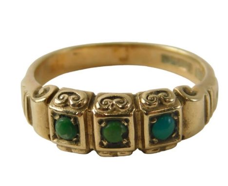 A 9ct gold turquoise dress ring, the rectangular panels set with three turquoise, with scroll sides, ring size O½, 4.5g all i