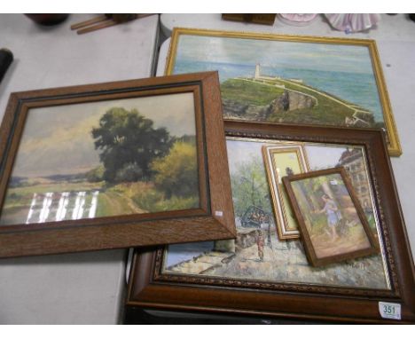 Signed Oil painting with street scenes: together with an oil painting of a lighthouse, two prints and one similar item (5) 