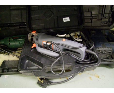 A Bosch hammer drill: together with a Wickes drill and a similar Challenge Extreme unit (3). 