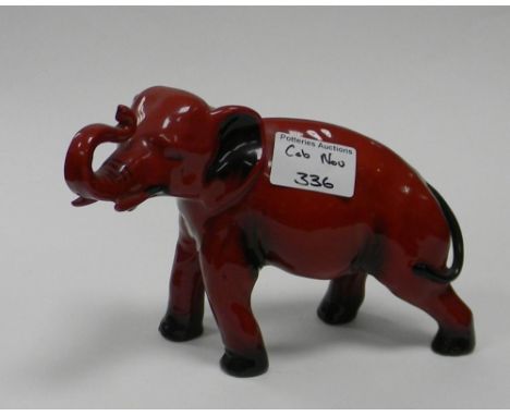 Royal Doulton Flambe model of a Elephant: Elephant with trunk in salute, height 14cm. 