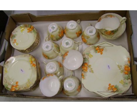 Shelley 1930's Winter Cherry tea ware items: side plates, cups, saucers, milk, sugar, cake plates etc (33 pieces). 