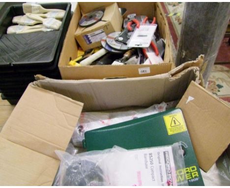 A quantity of new and used tools and DIY items: drills, pliers, grinding disks, band saw parts etc. 