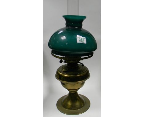 Brass oil lamp: with green shade. Height 52cm 