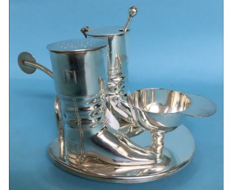 A plated hunting cruet, in the form of two boots and a cap