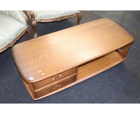 An Ercol coffee table, with two drawers