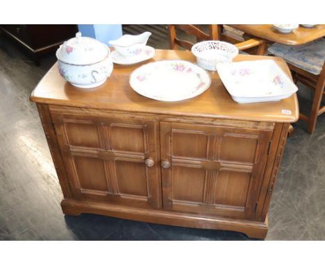 An Ercol two door cabinet