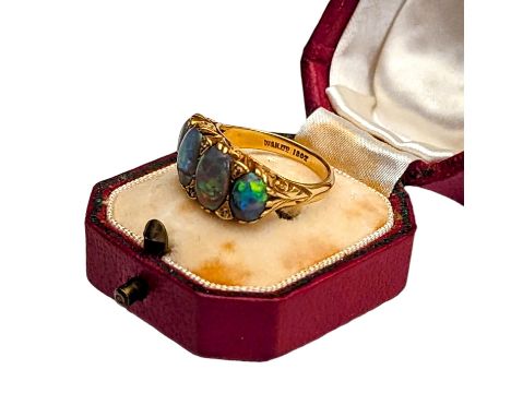 An 18ct gold opal and diamond ring, 7.2g, size 'N'