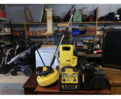 A Karcher and various power tools