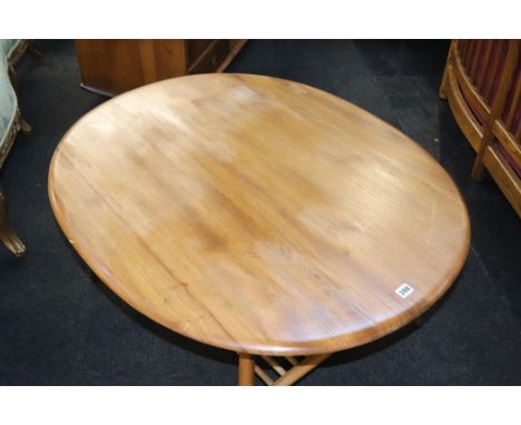 An Ercol Golden Dawn oval coffee table