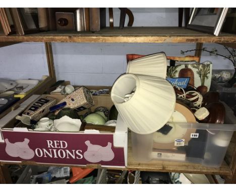 A shelf of assorted, to include china and lamps