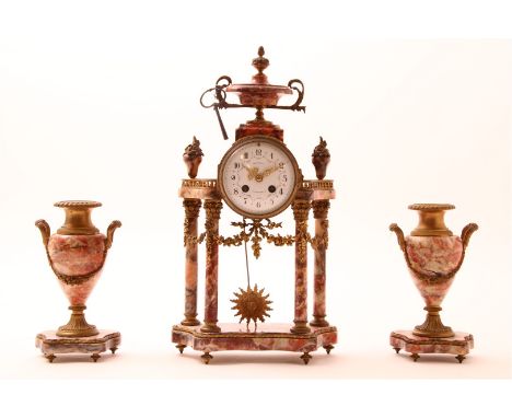 Column clock in partly marble case topped with lidded vase, enamel dial with Arabic numerals, address Mondier Clermont Ferran