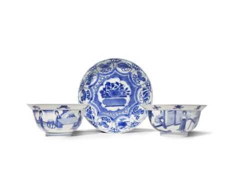 A CHINESE KRAAK PORCELAIN DISH AND TWO CHINESE BLUE AND WHITE BOWLS WANLI AND KANGXI The dish moulded and painted with a bask