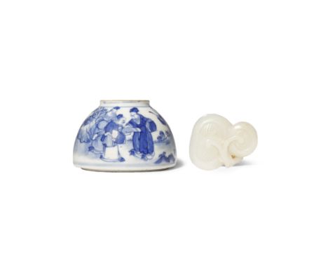 A CHINESE BLUE AND WHITE SOFT-PASTE WATERPOT AND A SMALL JADE CARVING 18TH CENTURY The waterpot with a beehive-shaped body, p