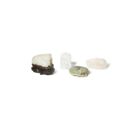 TWO CHINESE CELADON JADE ANIMAL CARVINGS AND TWO JADE PENDANTS 18TH AND 19TH CENTURY One a recumbent water buffalo together w