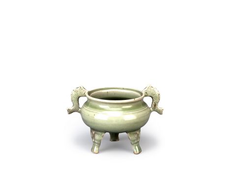 A CHINESE CELADON TRIPOD INCENSE BURNER YUAN/MING DYNASTY The compressed circular body with a waisted neck and two fish-shape