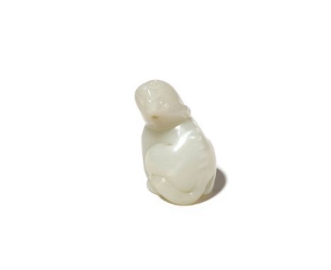 A CHINESE PALE CELADON JADE MYTHICAL BEAST QING DYNASTY OR LATER Seated with its head turned upwards to the left, its ears fl