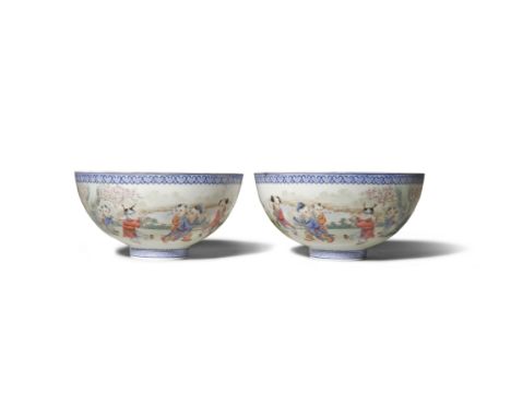 A PAIR OF CHINESE FAMILLE ROSE EGGSHELL PORCELAIN 'BOYS' BOWLS 20TH CENTURY Painted with continuous scenes of boys in a garde